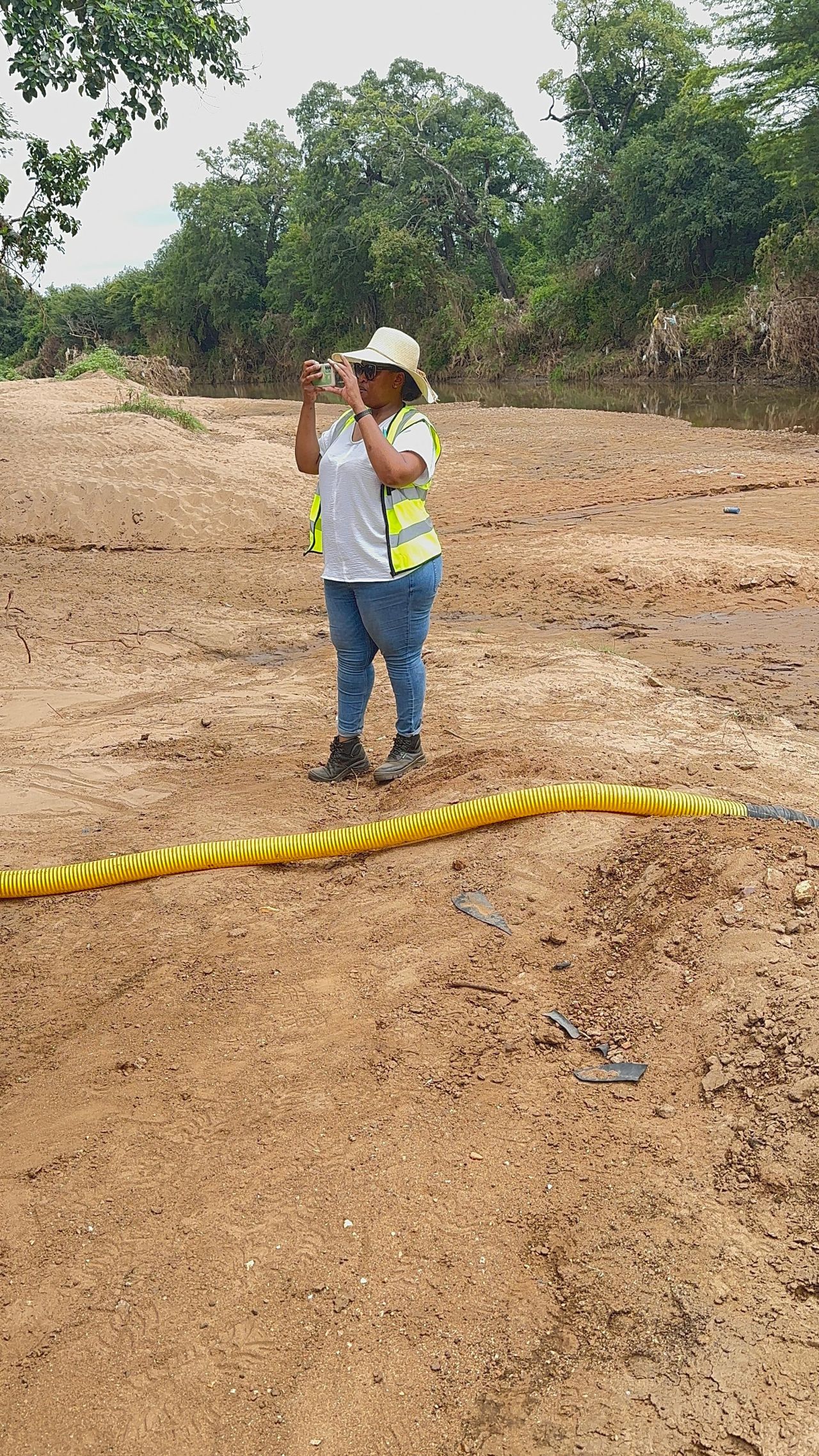 ANICA consultant recording observations during an environmental field assessment